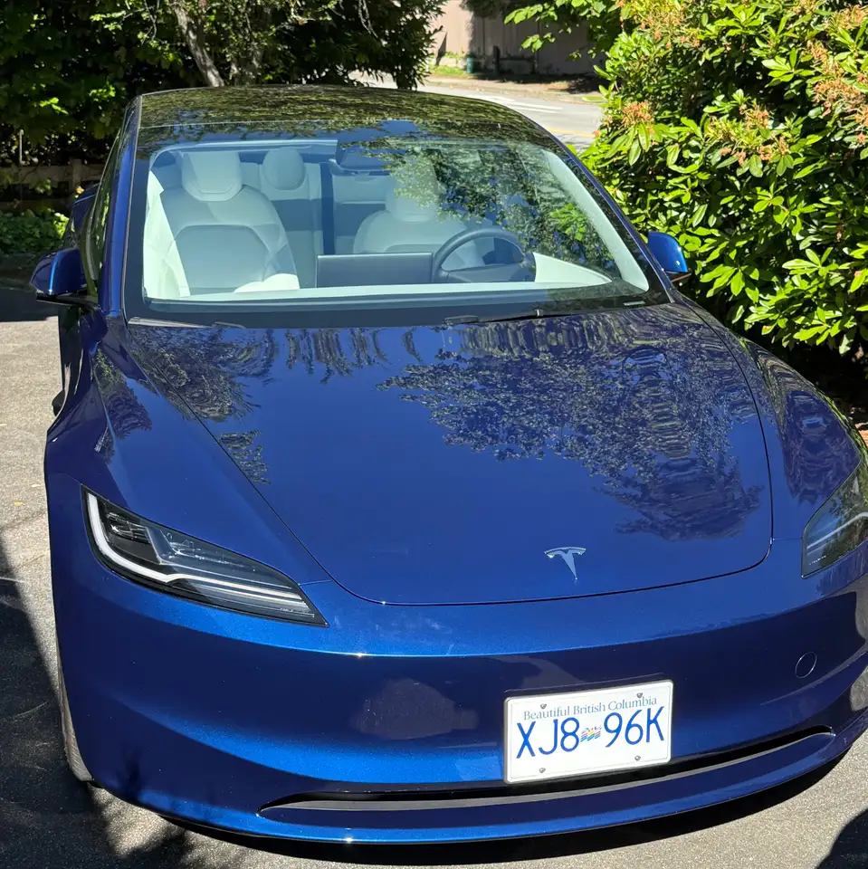 Tesla Model 3 photo Tesla Model 3