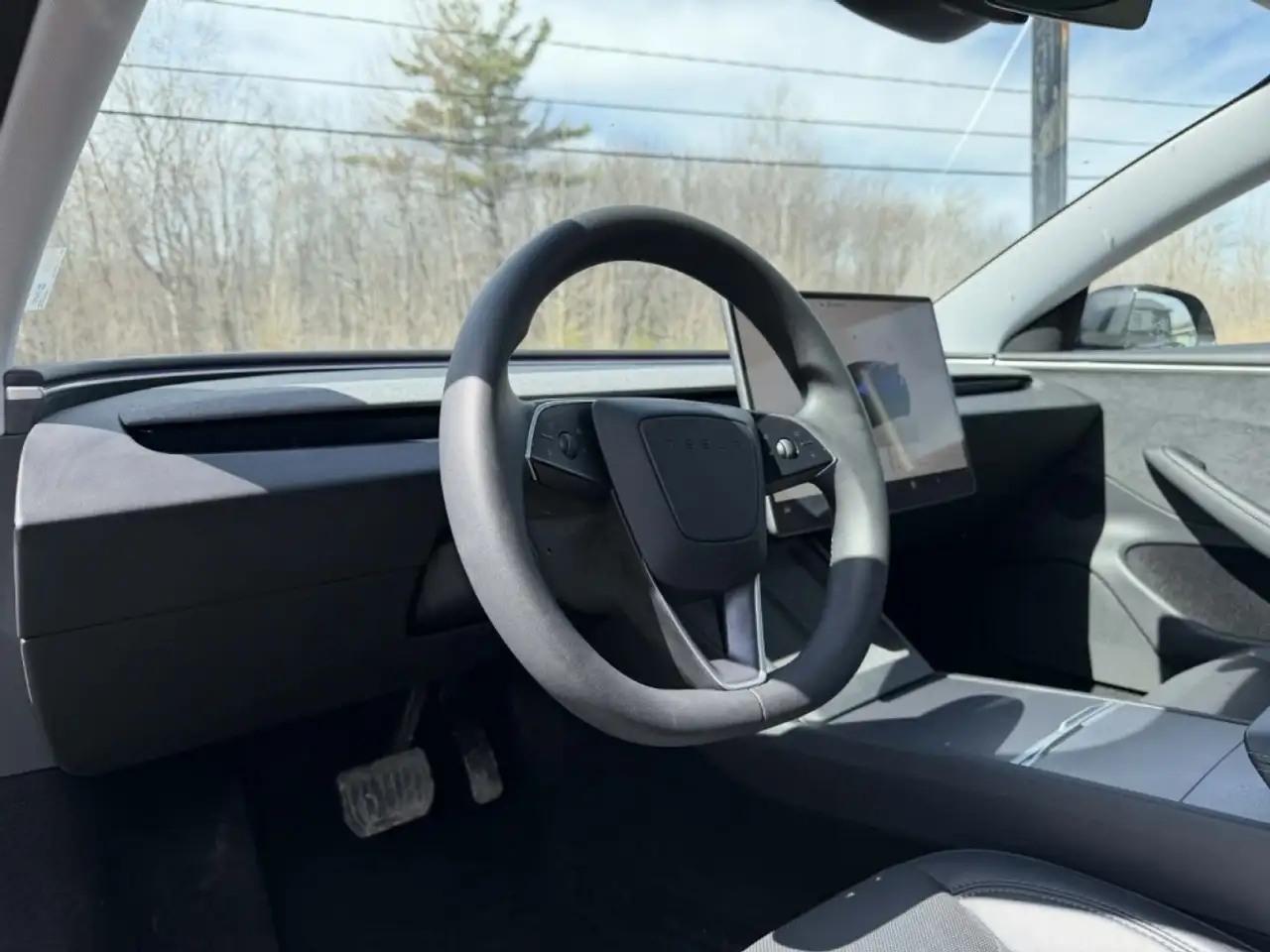 Tesla Model 3 photo Tesla Model 3